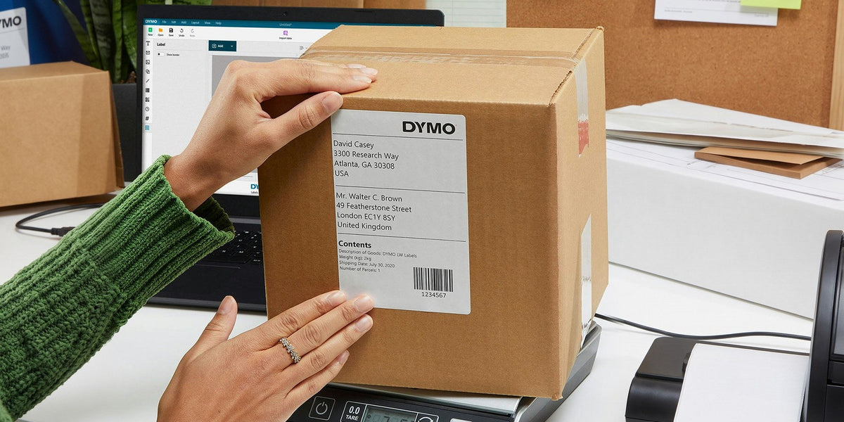 Shipping label on a parcel being weighed on DYMO shipping scales