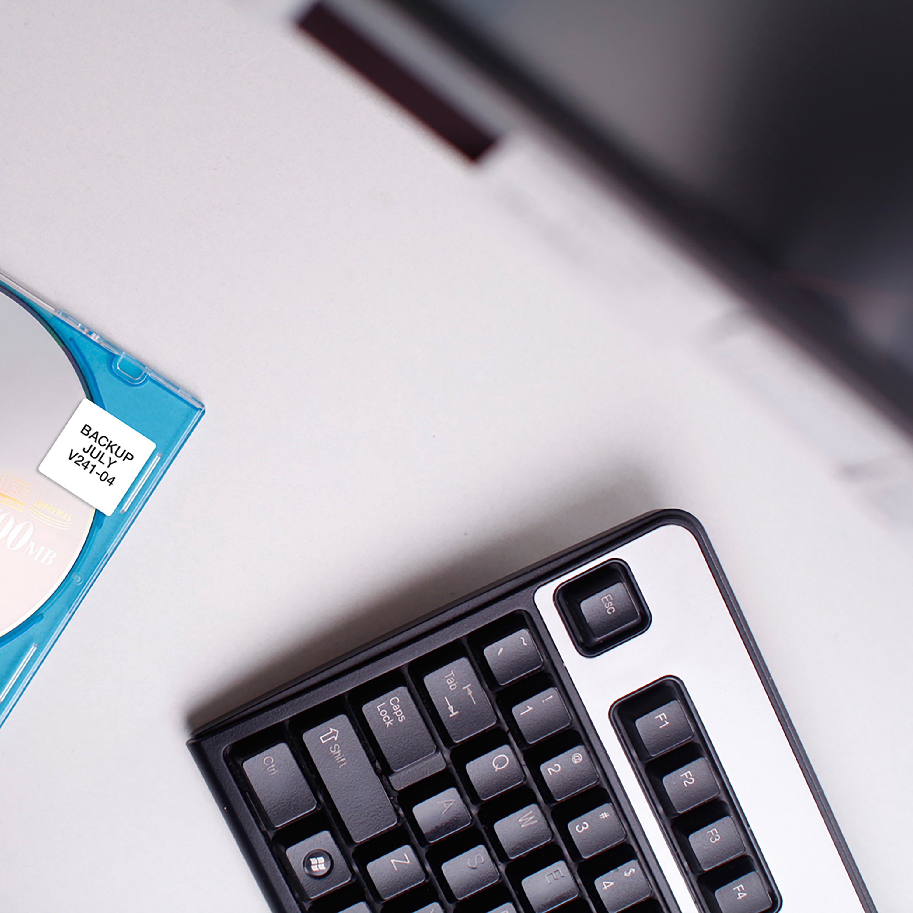 Calculator and office desk items with a printed label
