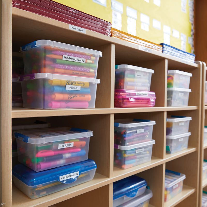 Shelving unit with labelled storage boxes and office supplies