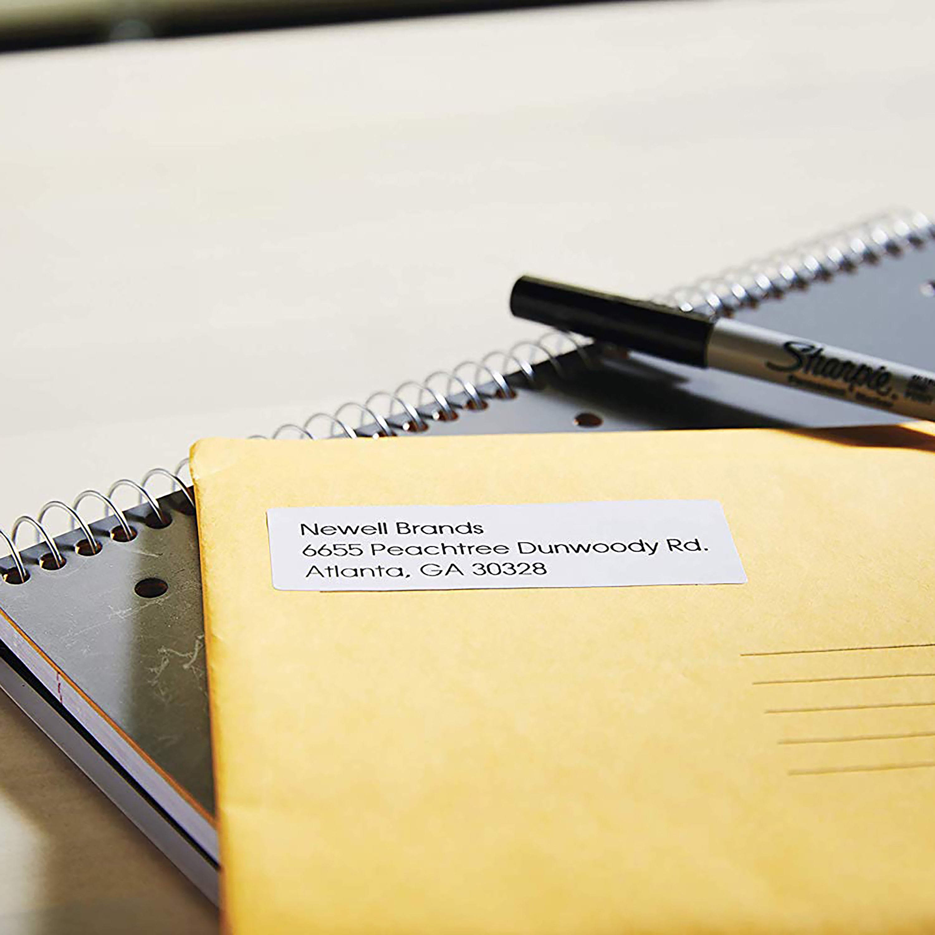 Yellow padded mailer with printed return label