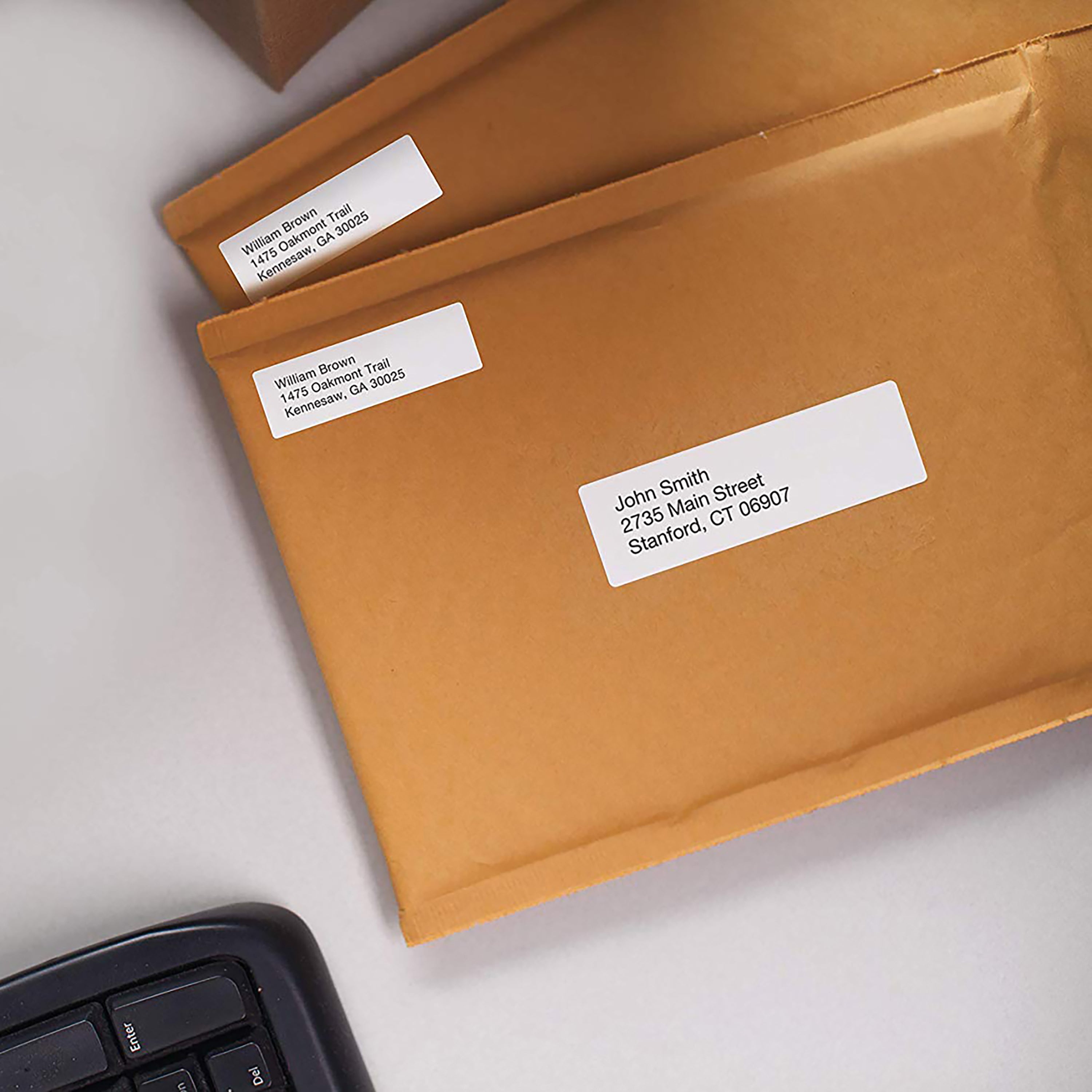 Brown document wallet with white address label