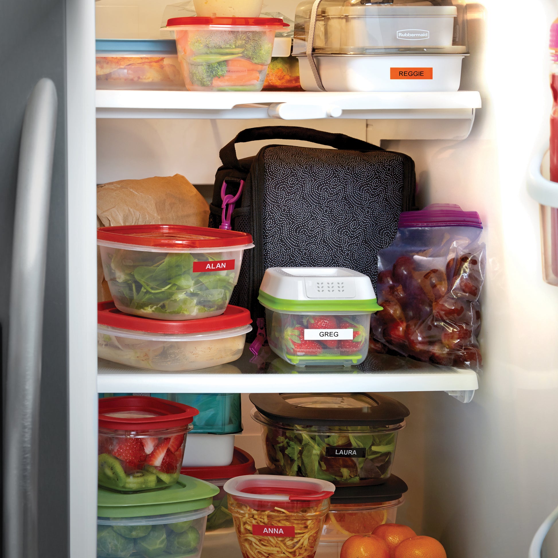Fridge and pantry shelves organised with labelled food storage containers