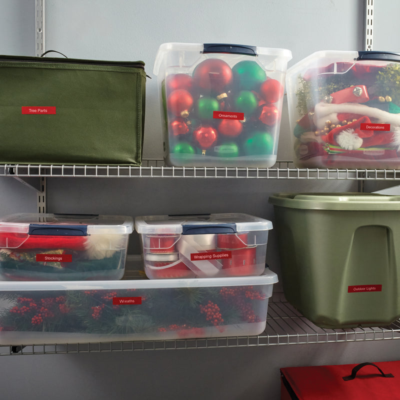 Shelving unit organised with labelled storage tubs for Christmas decorations, wreaths, stockings and wrapping supplies