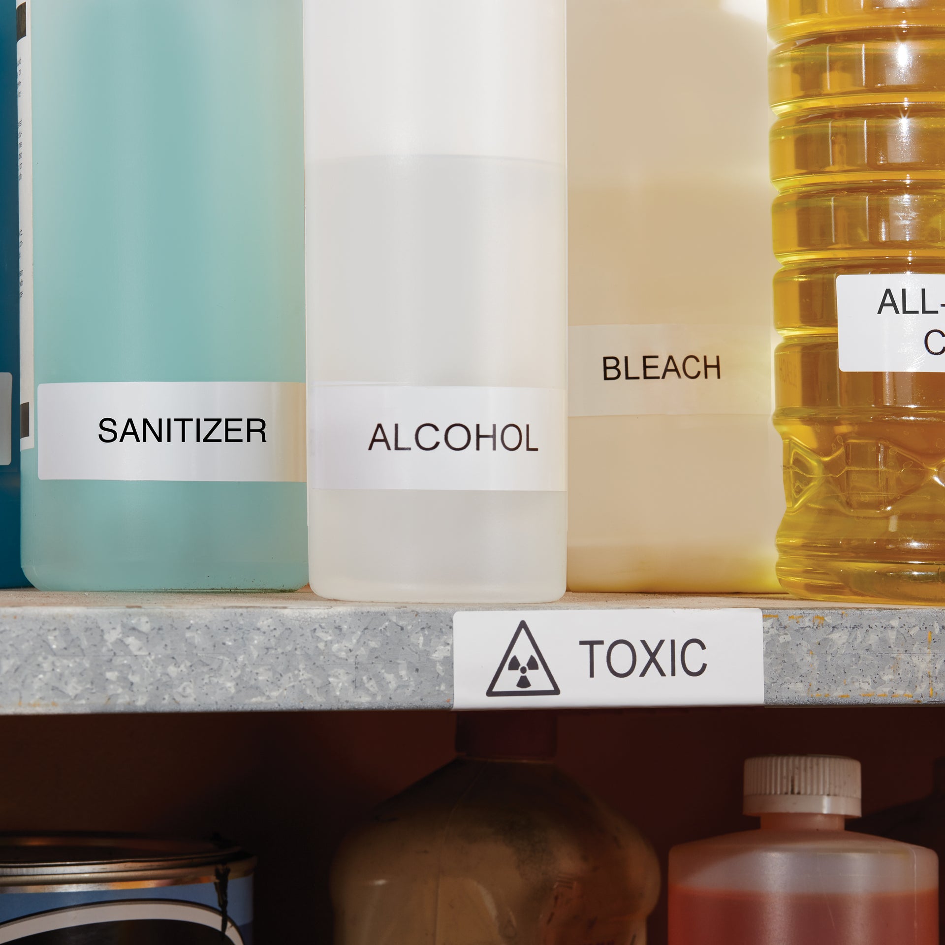 Labelled pantry jars and kitchen containers on open shelving
