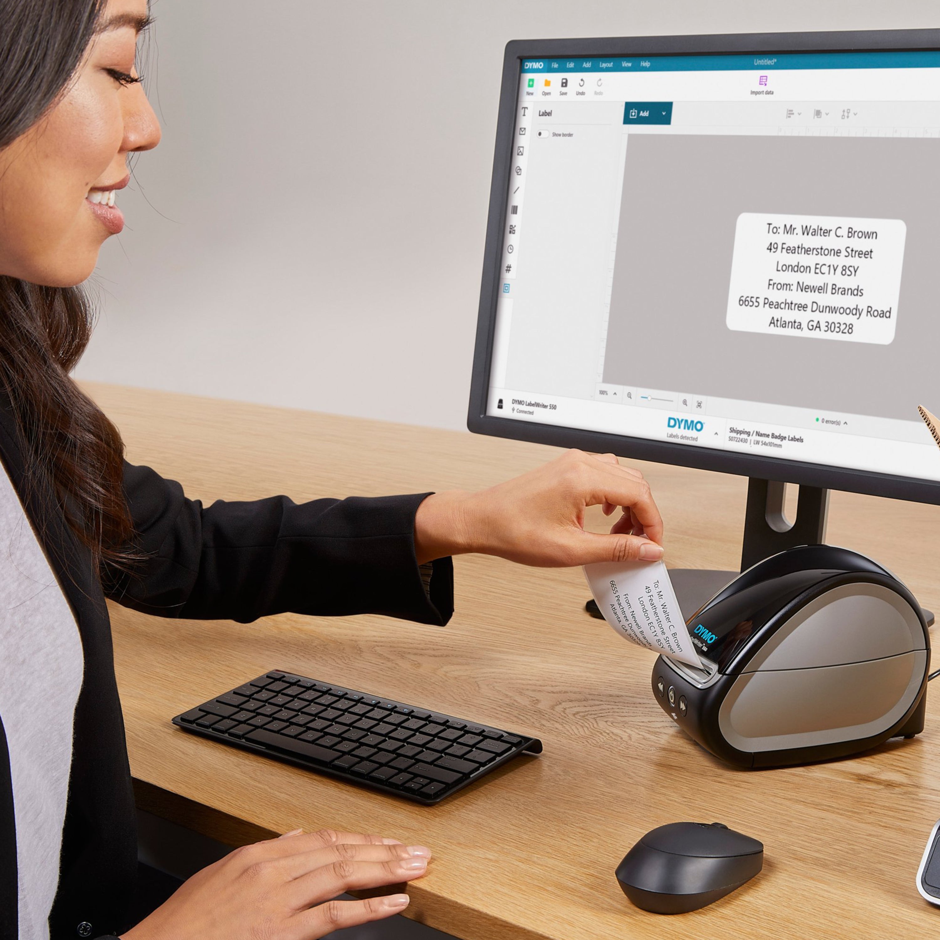 Dymo Labelwriter 550 in use in office environment.