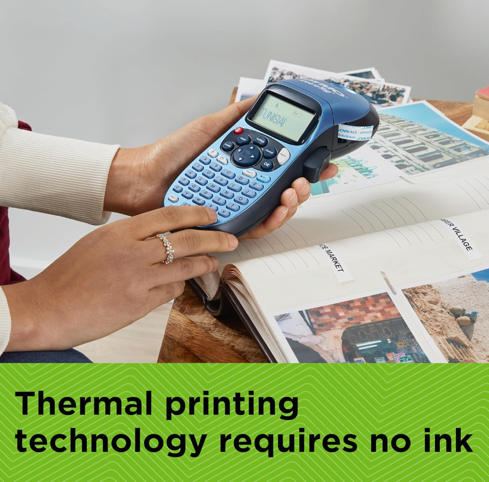 Label being printed from DYMO LetraTag LT100H Blue handheld labelling device