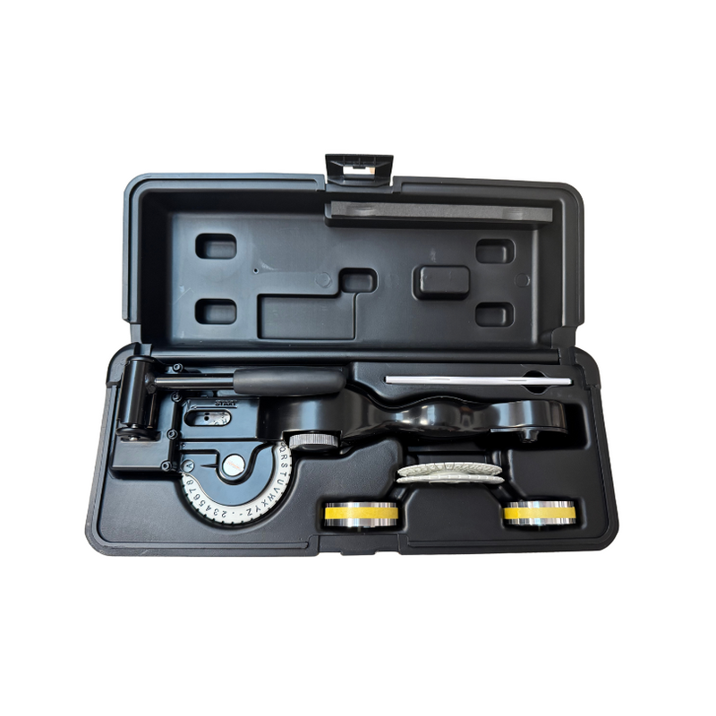 Top view of Rhino M1011 metal label embossing tool and accessories in durable black case.