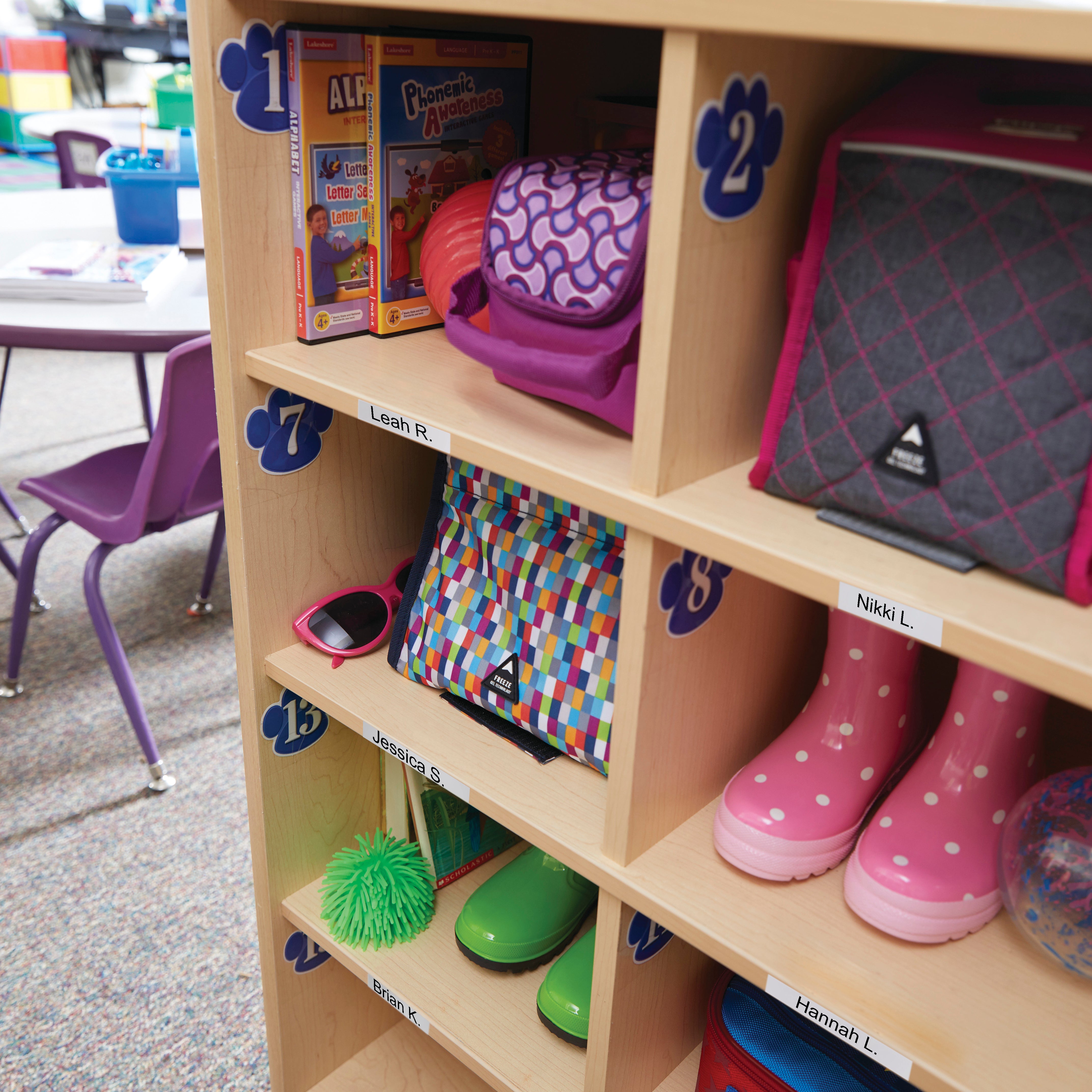 Classroom cubby shelf with numbered sections and personalised name labels for student storage and organisation