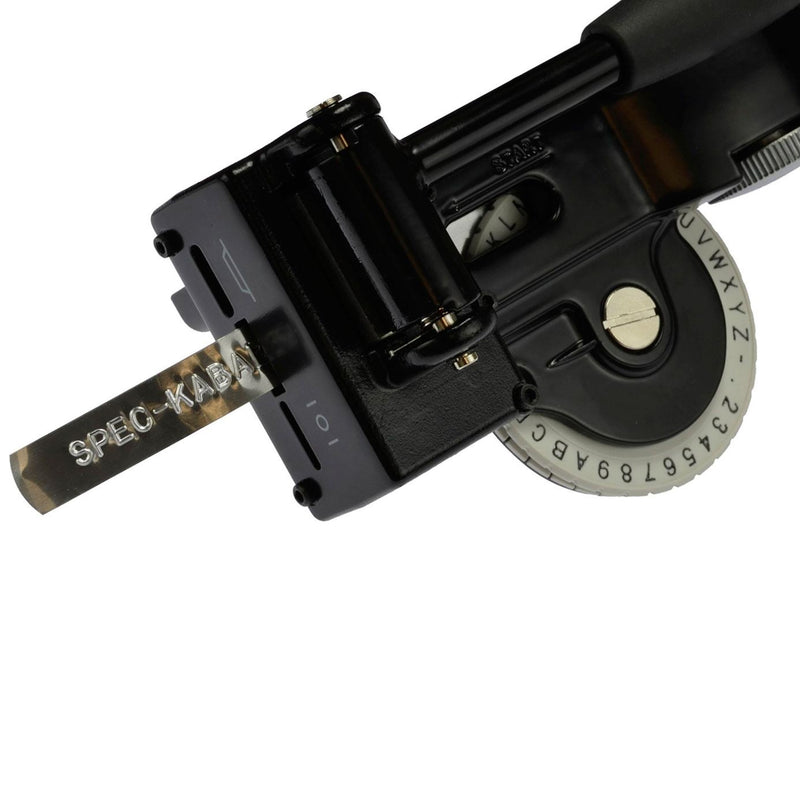 DYMO Rhino metal tape embosser creating an embossed aluminium label marked SPEC KABA