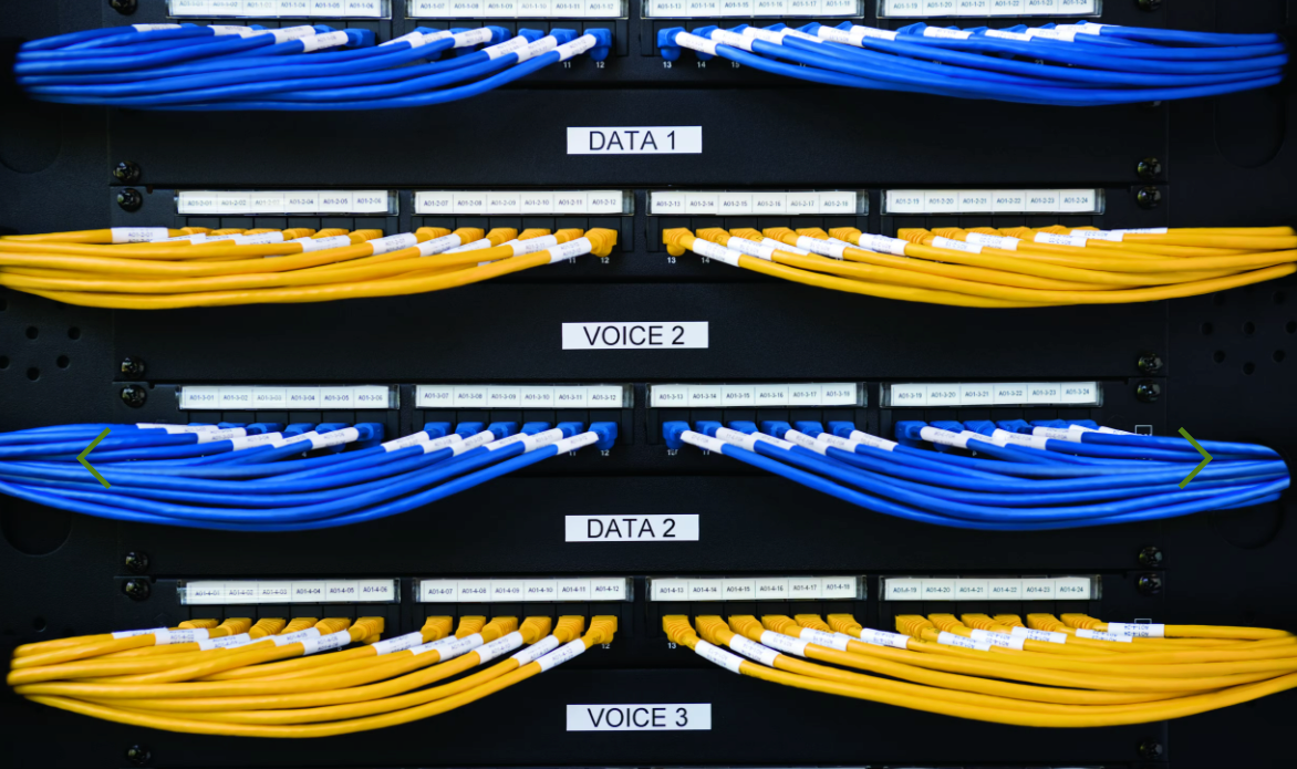 DYMO Rhino white on black 24mm laminated labels used on multiple blue and yellow wires
