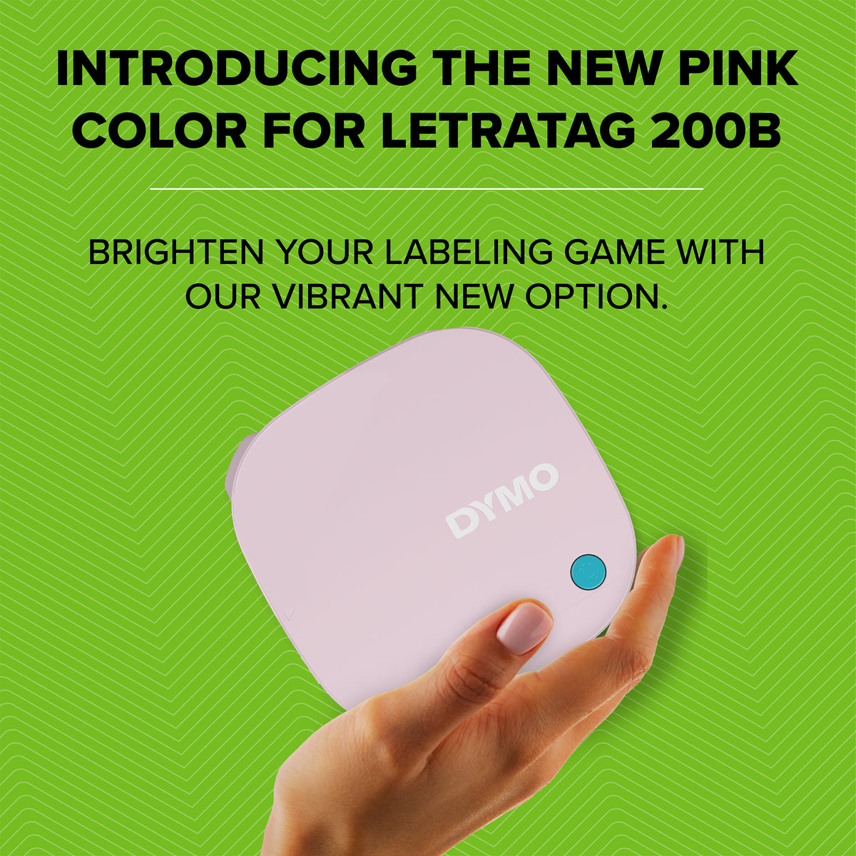 Hand holding the pink LetraTag 200B label maker